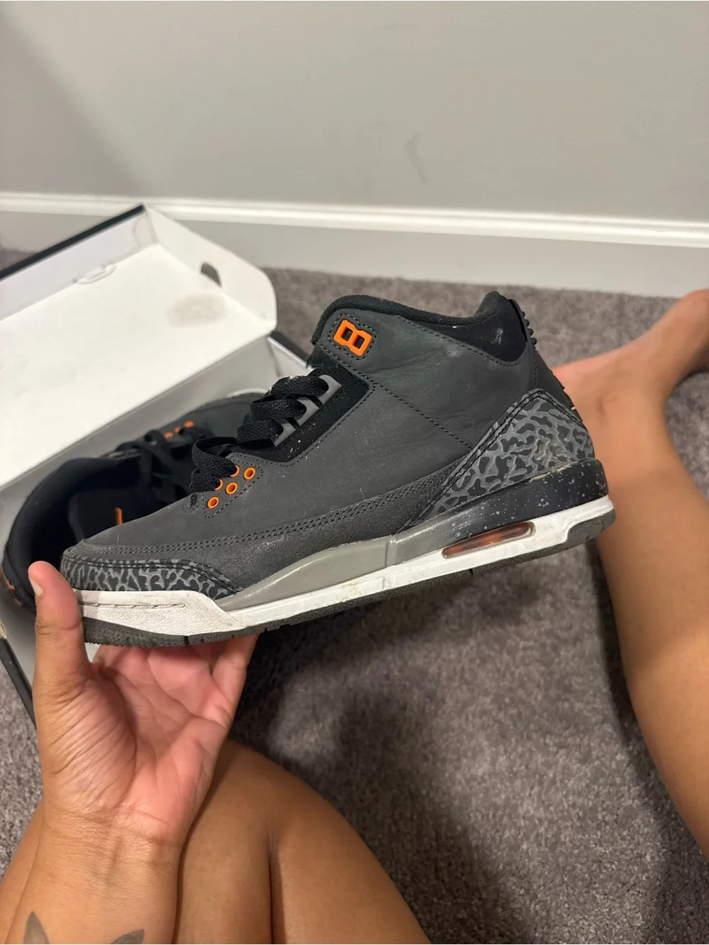 Jordan Black Sneakers with Orange Accents